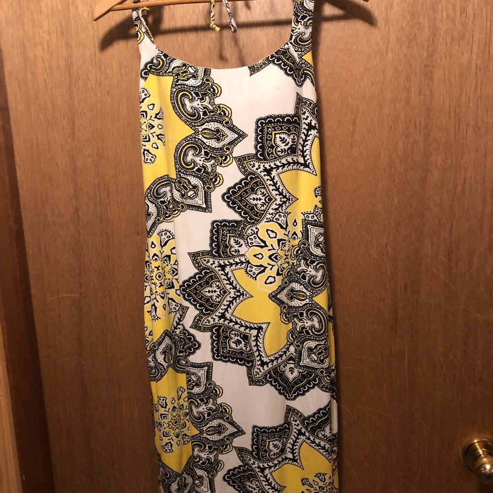 Cache form fitting halter dress.
